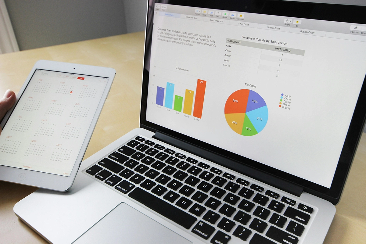 open laptop with graphs