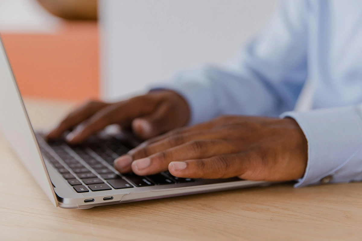 typing on a laptop